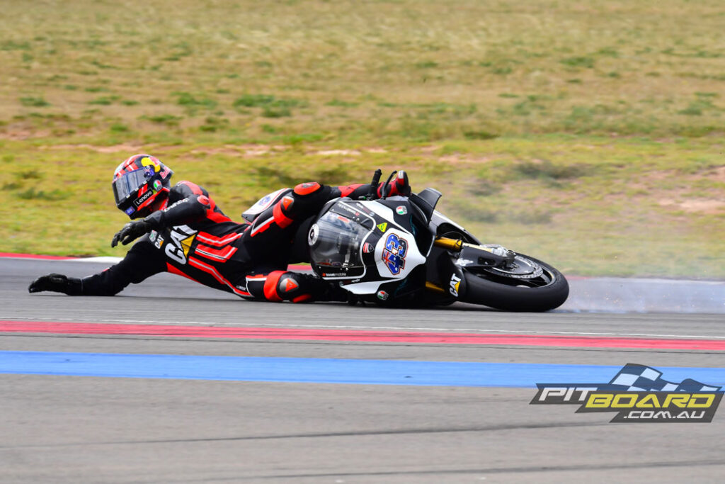Jack Miller slides out of practice while learning the limits of his V4R and Michelin slicks at The Bend.