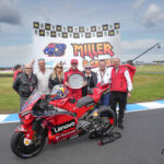 The Miller family with Dorna CEO Carmelo Ezpeleta (L), circuit owner Andrew Fox and AGPC CEO Andrew Westacott.